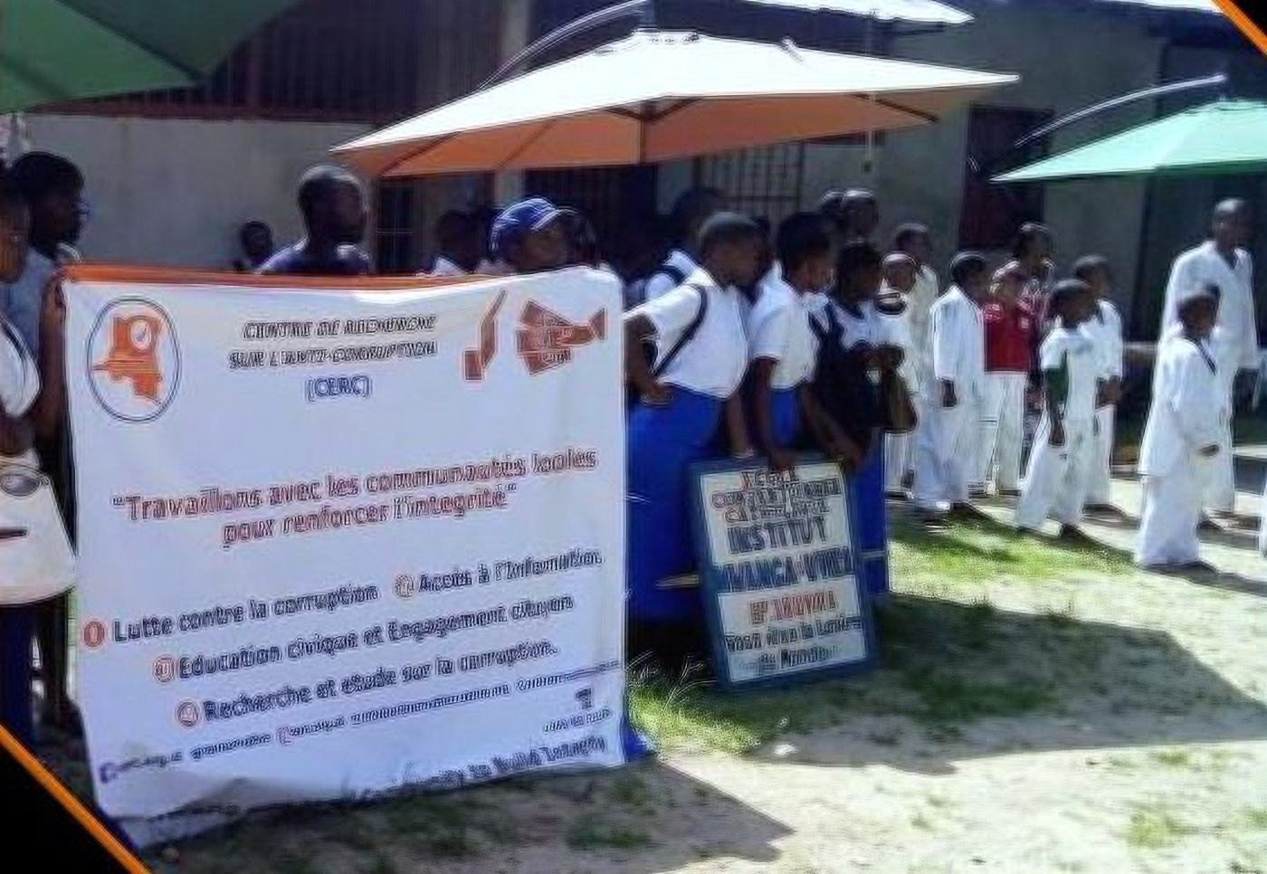 Students and a CERC banner at an outreach event