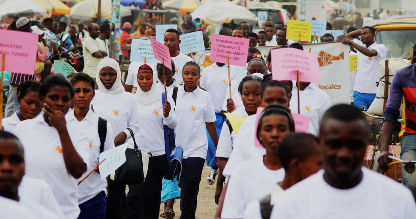 Students marching with placards in Uvira