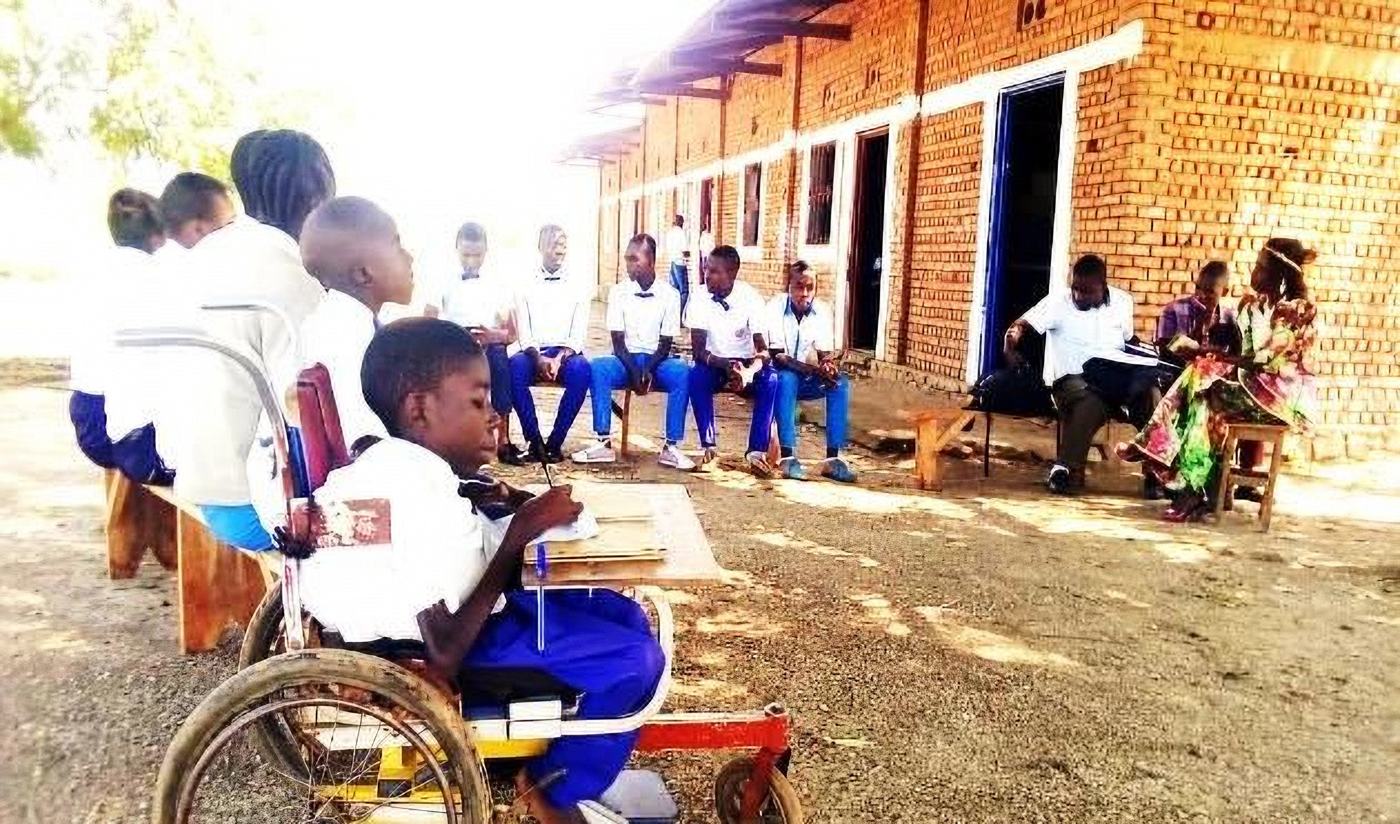 Students, one in a wheelchair, at a school in Uvira