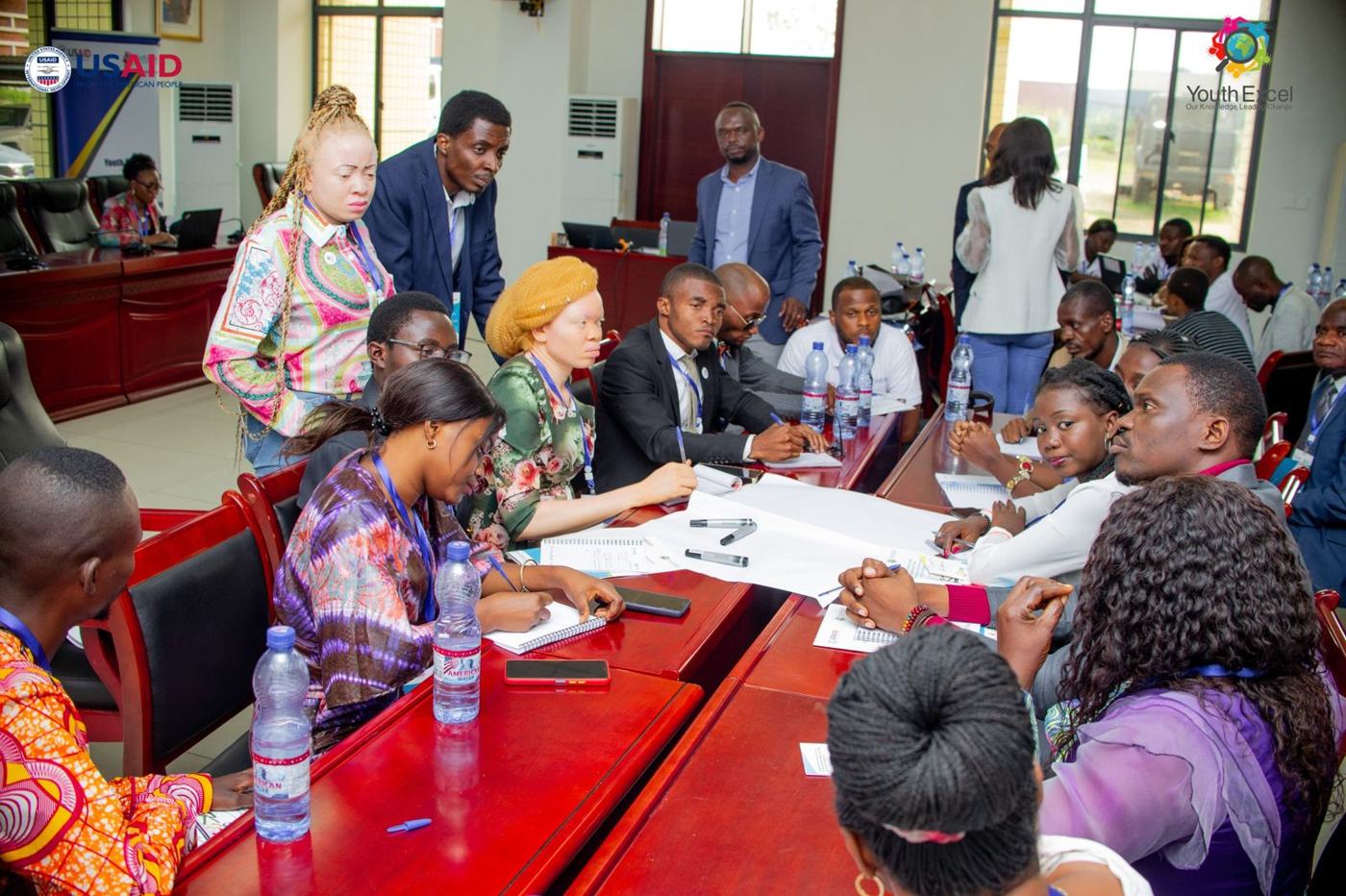 Participants working in groups at the Data Summit